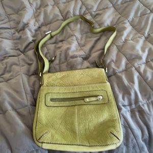 Green shoulder/cross body bag.